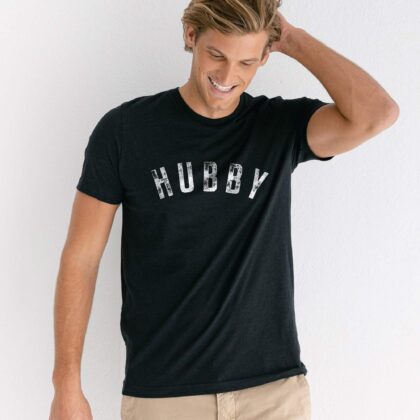 a handsome man wearing a hubby t-shirt in black