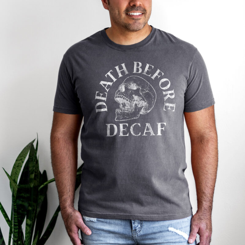 A man wearing a Death Before Decaf Garment Dyed Tee in pepper