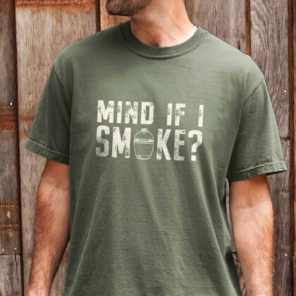 a man wearing a Mind If I Smoke Shirt in moss