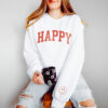 a woman wearing a happy sweatshirt in white