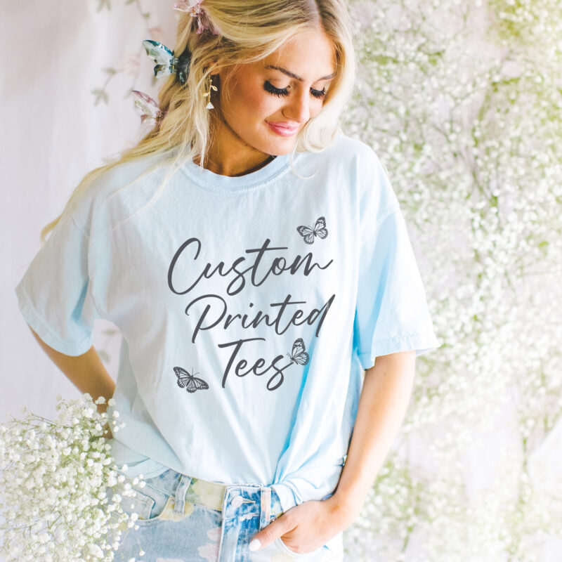 a woman wearing a Custom Comfort Colors Tee - Spring Colors in Chambray