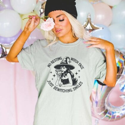a woman wearing a Bewitching Smiles T-Shirt in bay