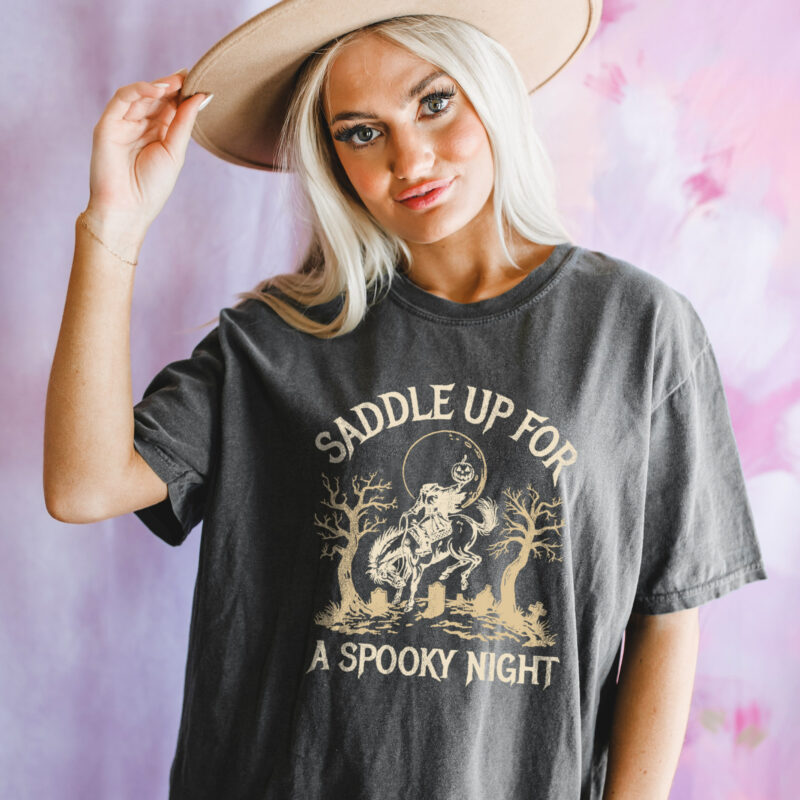 a woman wearing a headless horseman t-shirt in pepper