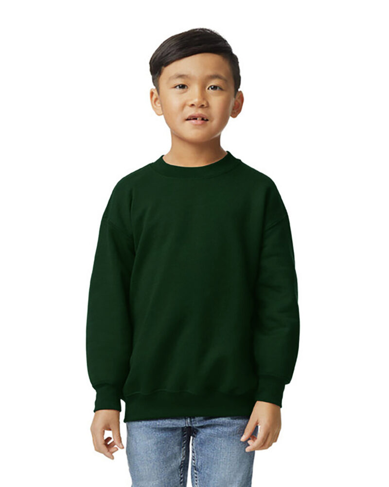 a boy wearing a custom youth crewneck sweatshirt in forest