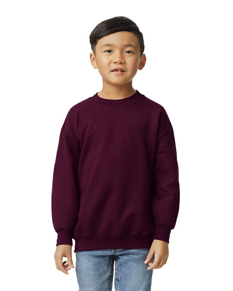 a boy wearing a custom youth crewneck sweatshirt in maroon