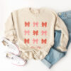 an autumn girly sweatshirt in sand