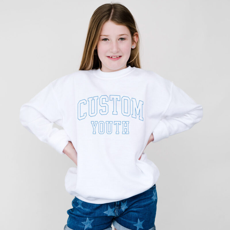 a young girl wearing a custom youth sweatshirt in white