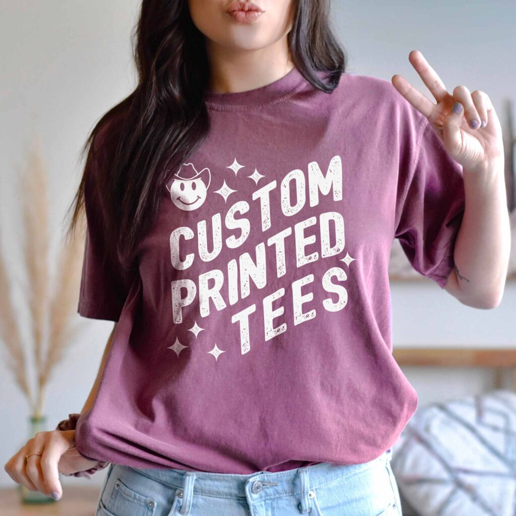 A young woman wearing an online designer custom printed tee in Berry