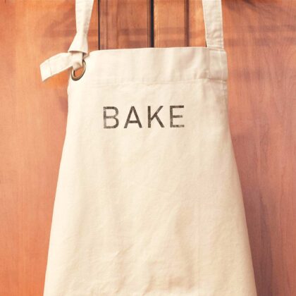 a Heavy Cotton Canvas BAKE Apron in natural