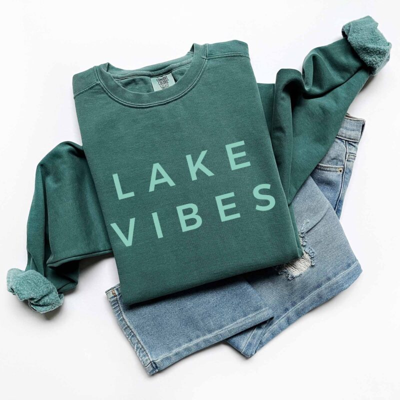 a lake vibes sweatshirt in blue spruce