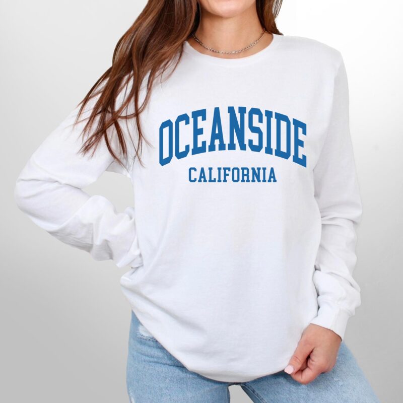 a woman wearing a Custom Long Sleeve Jersey Tee in white