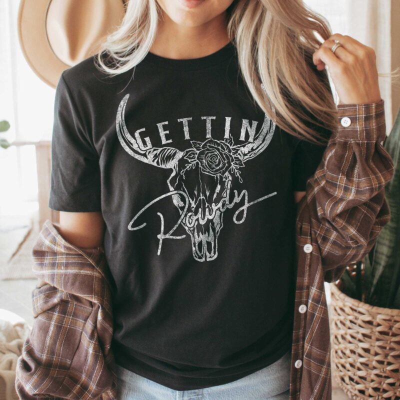 a woman wearing a a getting rowdy lightweight tee in black