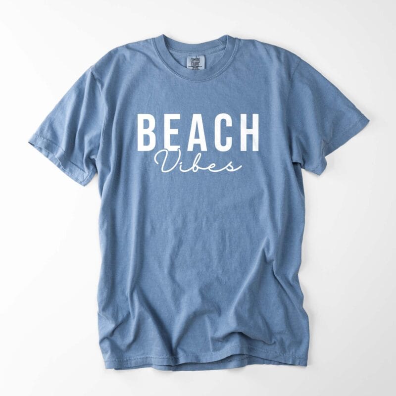 a beach vibes tee in blue jean