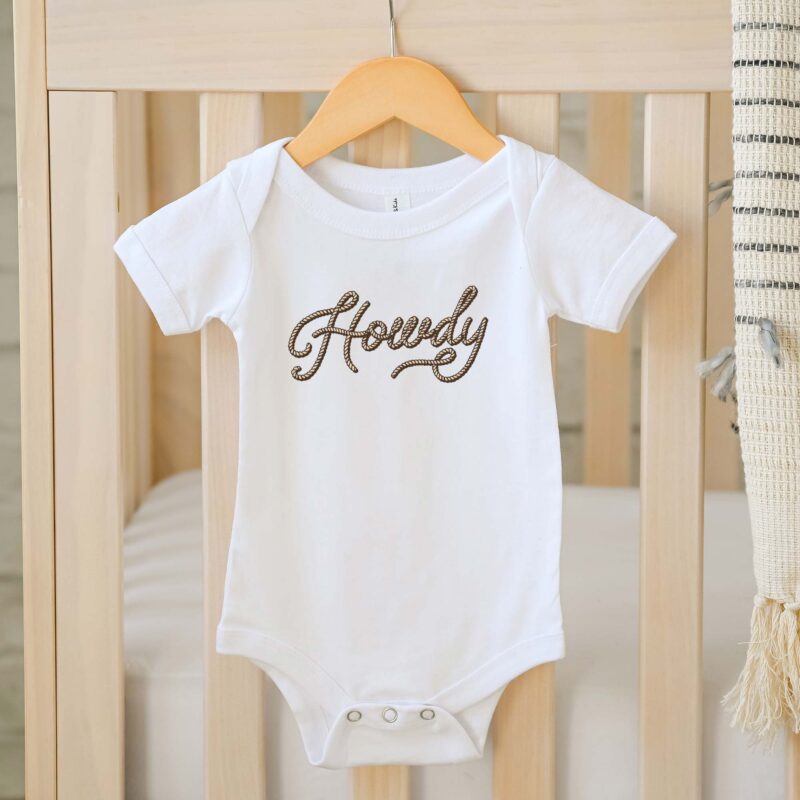 a Howdy Baby Onesie in white