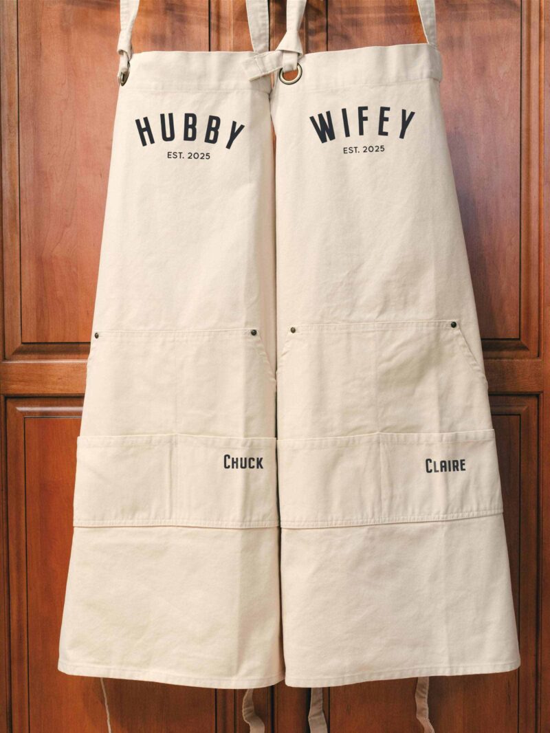 a Heavy Cotton Canvas Personalized Hubby Wifey Apron Set in natural
