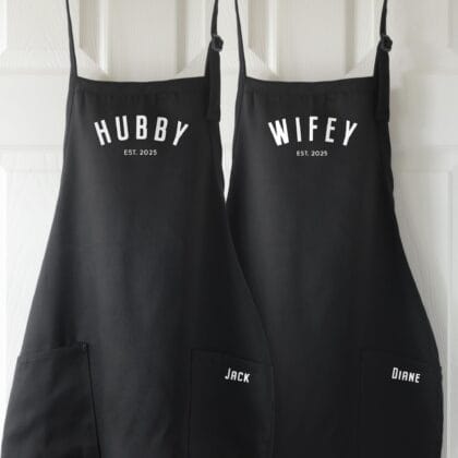 a personalized hubby wifey apron set in black