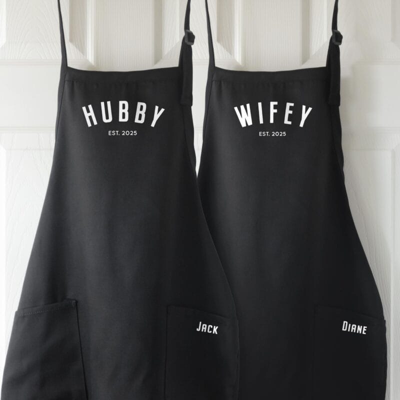 a personalized hubby wifey apron set in black