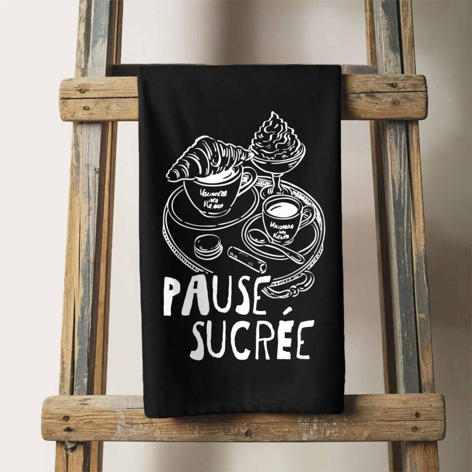 a Pause Sucrée tea towel in black