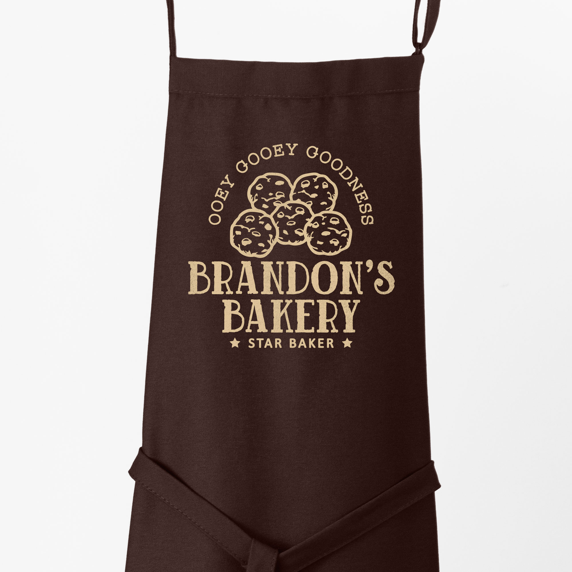 a Premium Personalized Cookie Baking Apron in brown