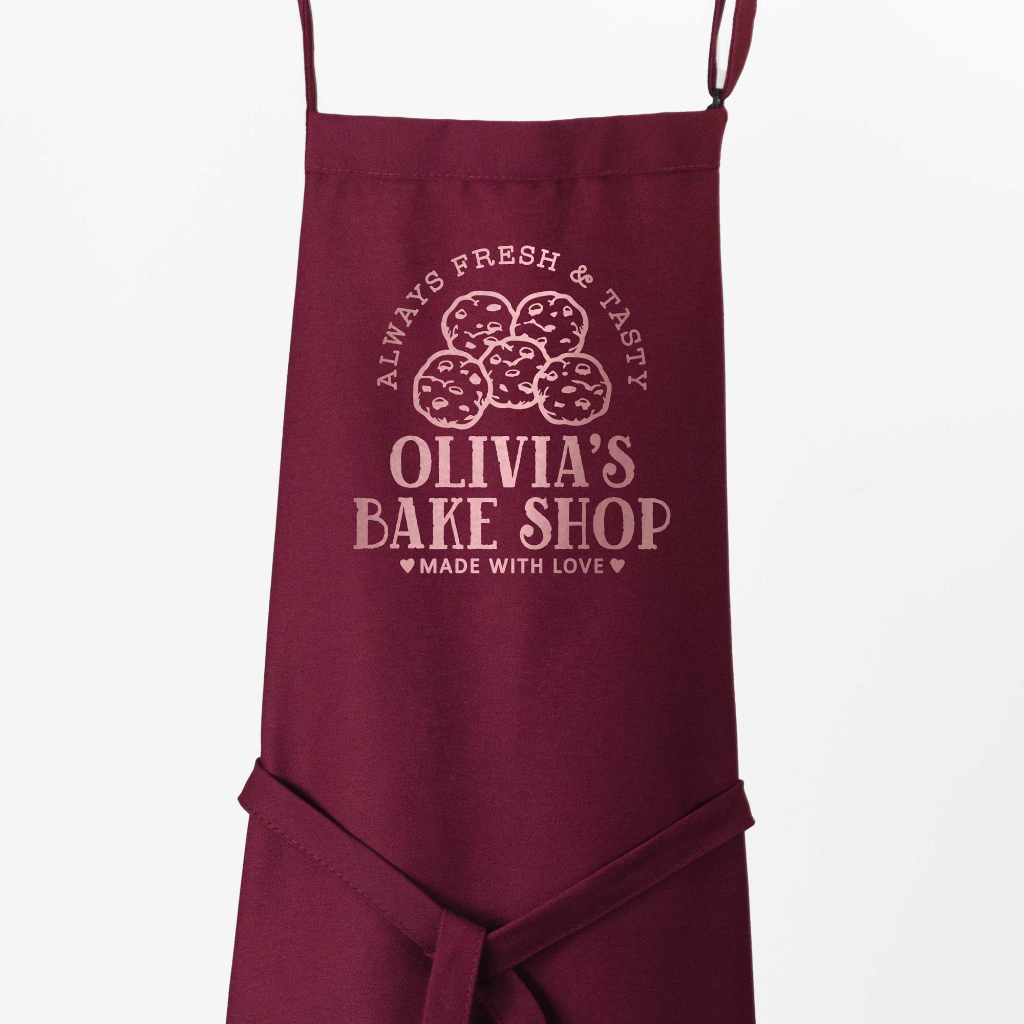 a Premium Personalized Cookie Baking Apron in maroon