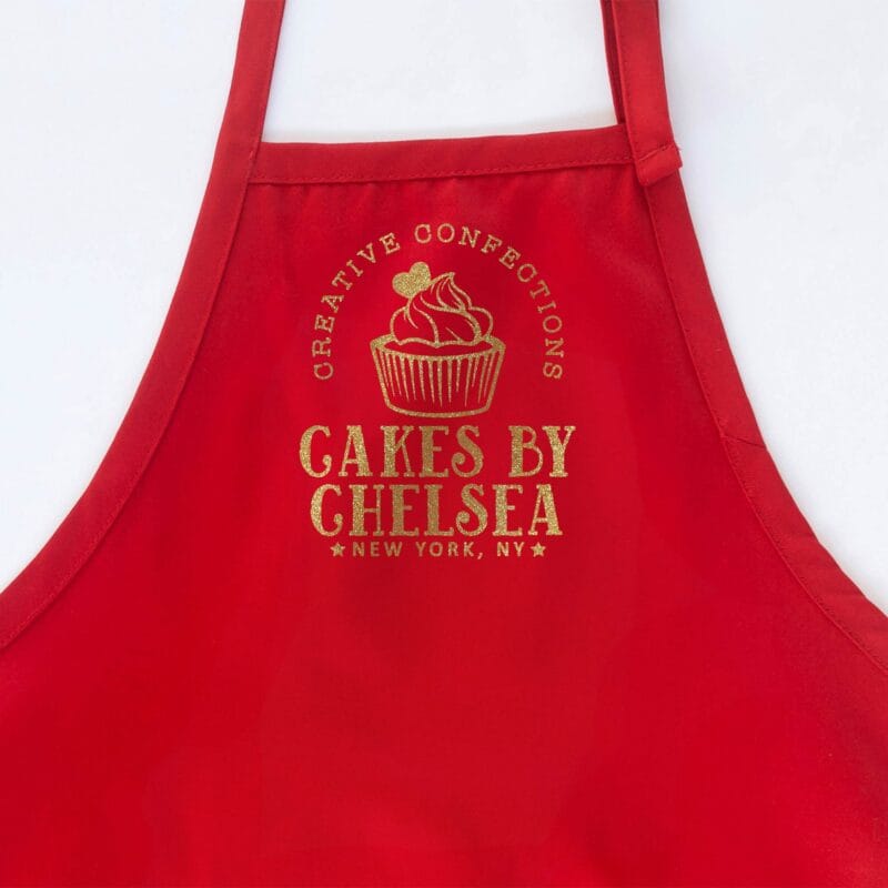 a cupcake baking apron in red