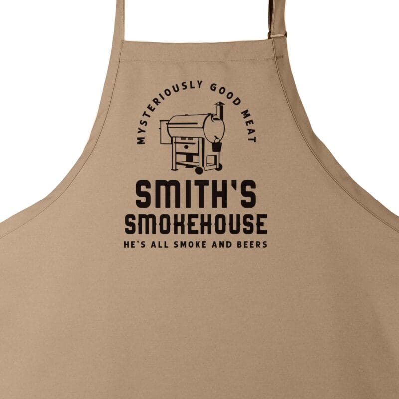 a personalized meat smoker apron in khaki