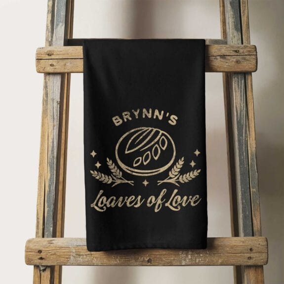 a personalized sourdough loaves tea towel in black