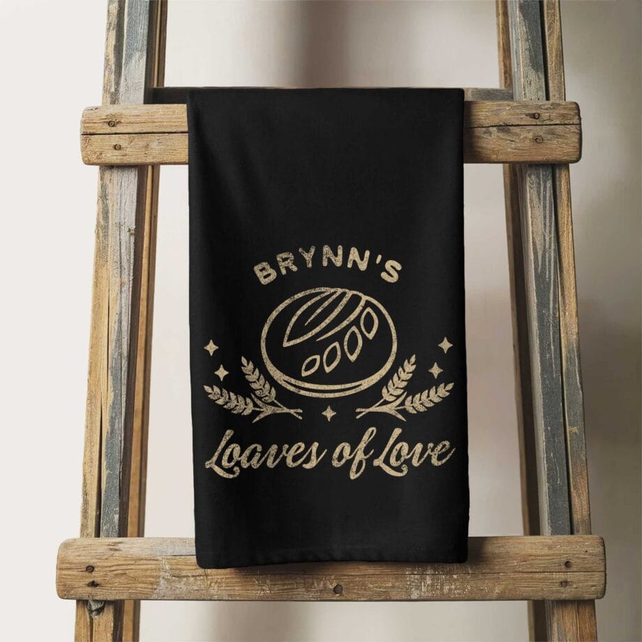a personalized sourdough loaves tea towel in black