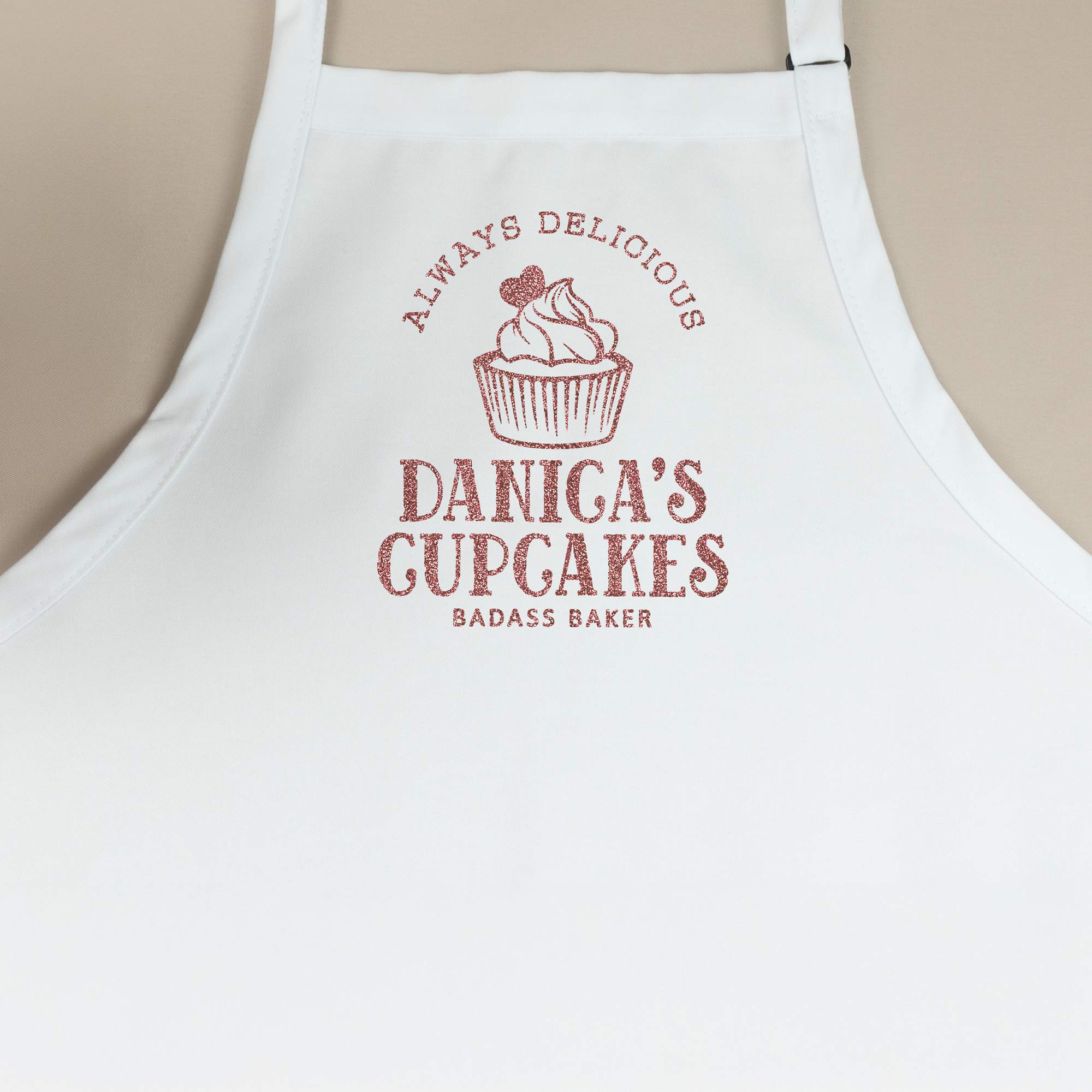 a Personalized-cupcake-baking-apron-in white