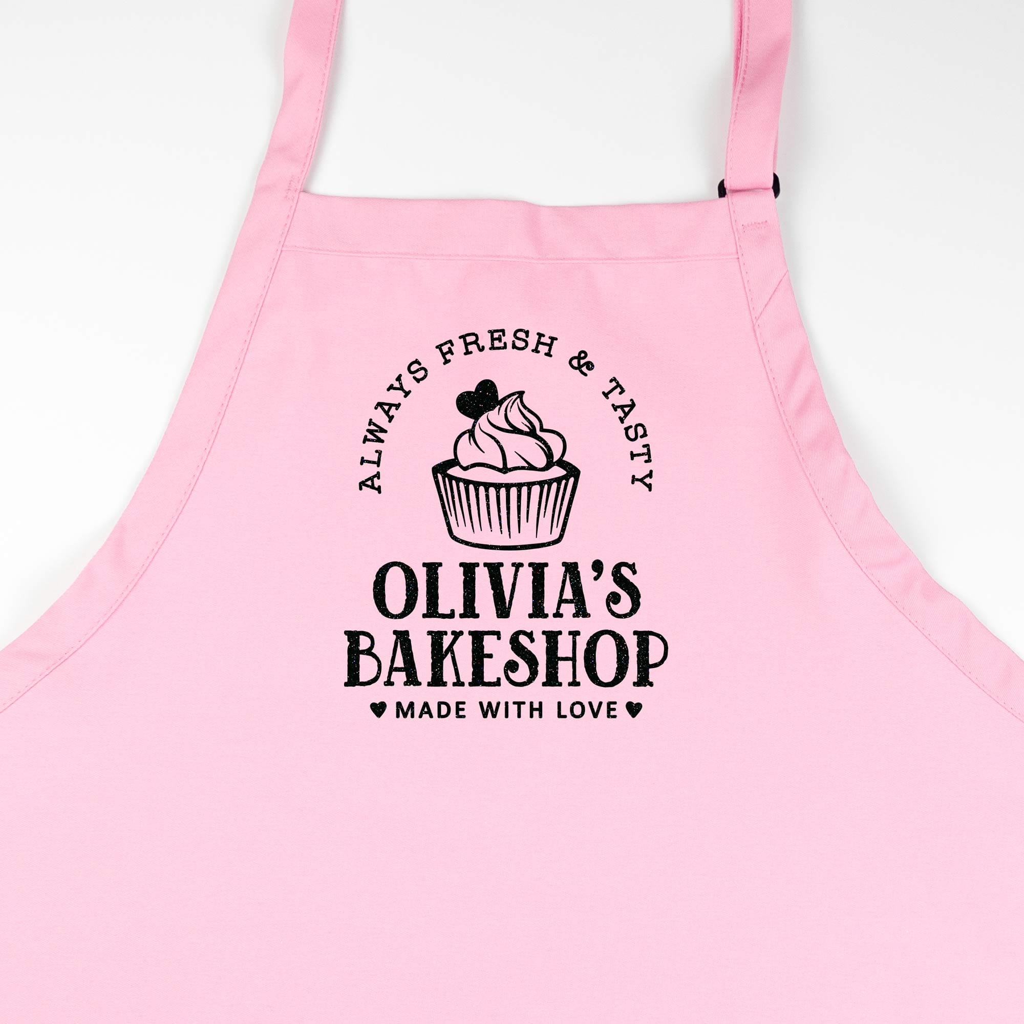 a Personalized-cupcake-baking-apron-in pink