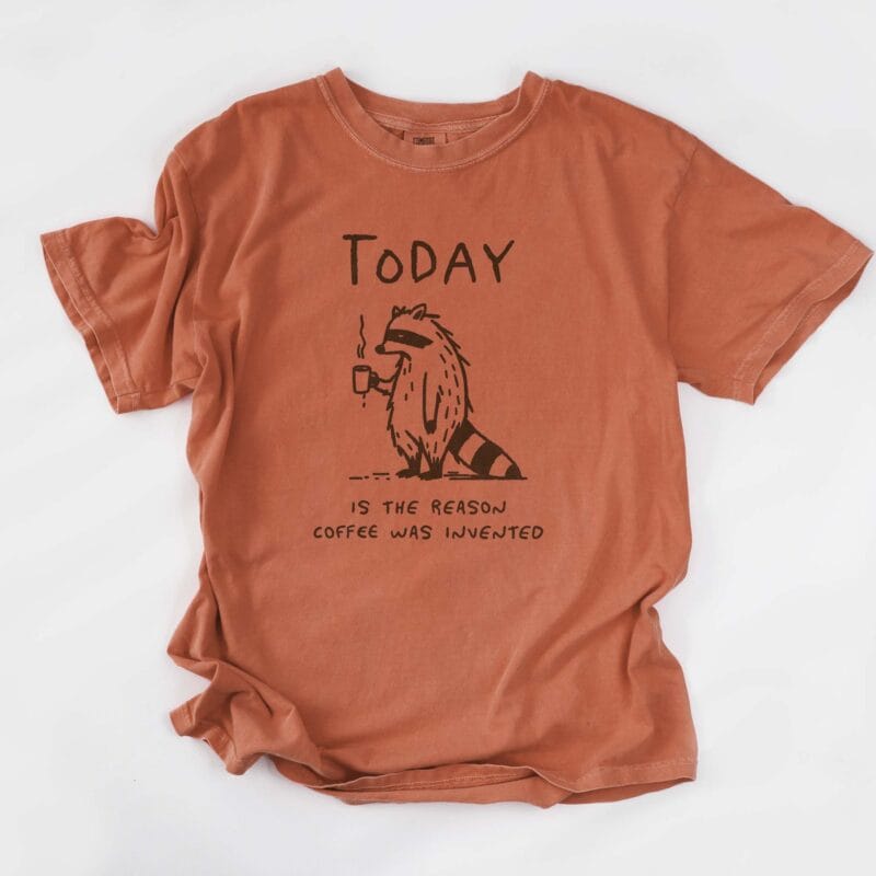 a coffee raccoon tee in yam