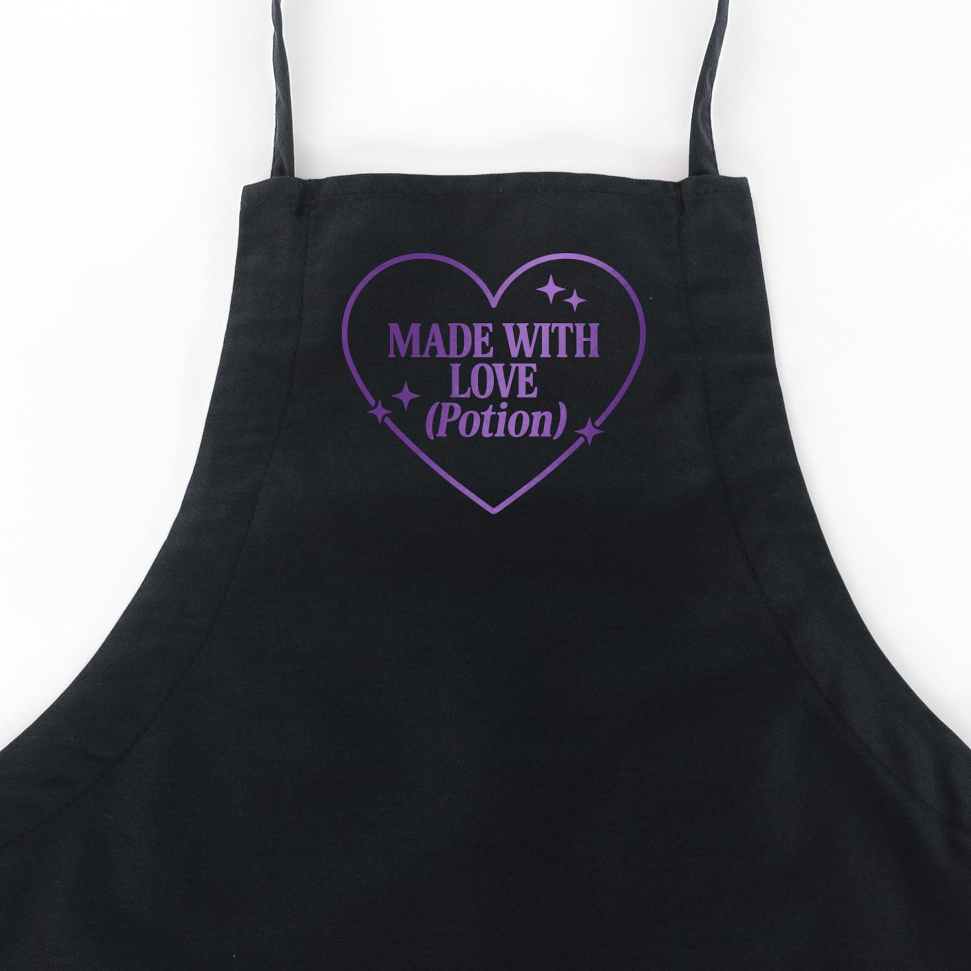 a Made With Love (Potion) Butcher Apron in black with a purple metallic print