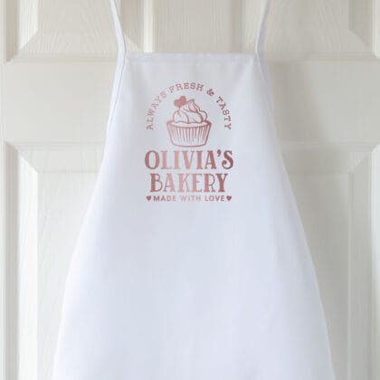 a premium personalized kids cupcake apron in white
