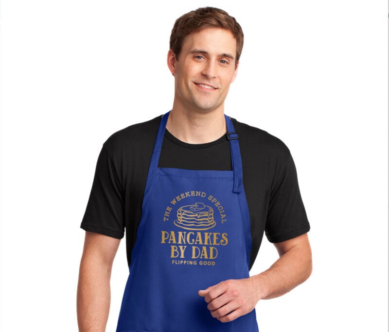 a man wearing a Personalized Pancake Breakfast Apron in royal