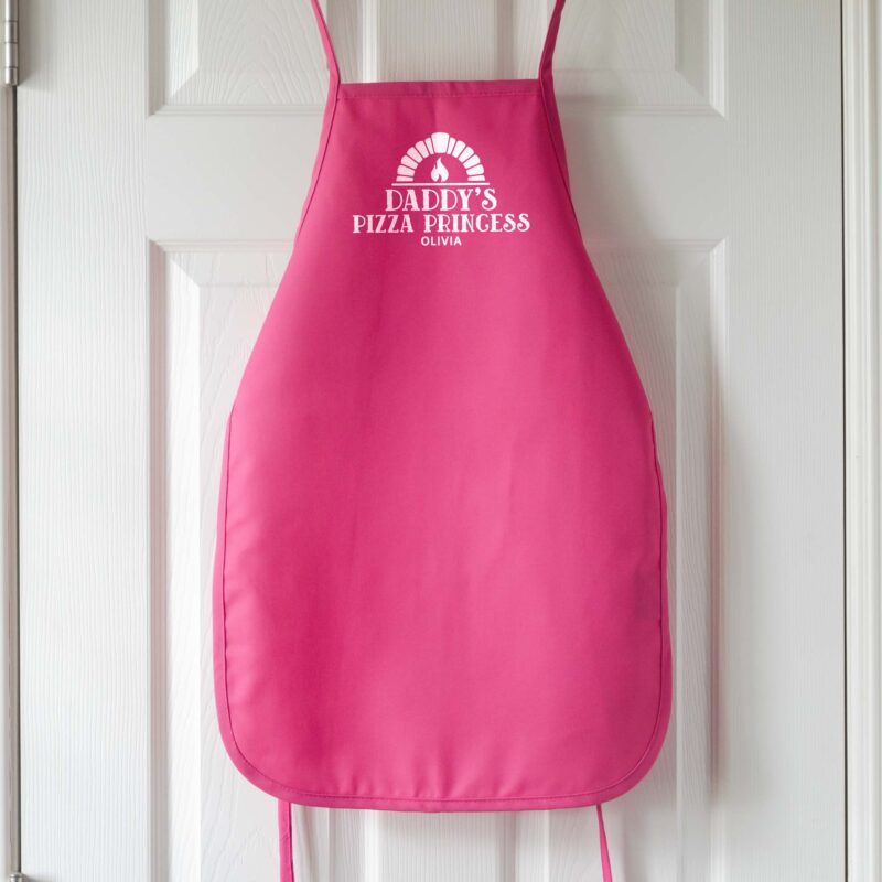 a kids Premium Personalized Pizza Oven Apron in hot pink