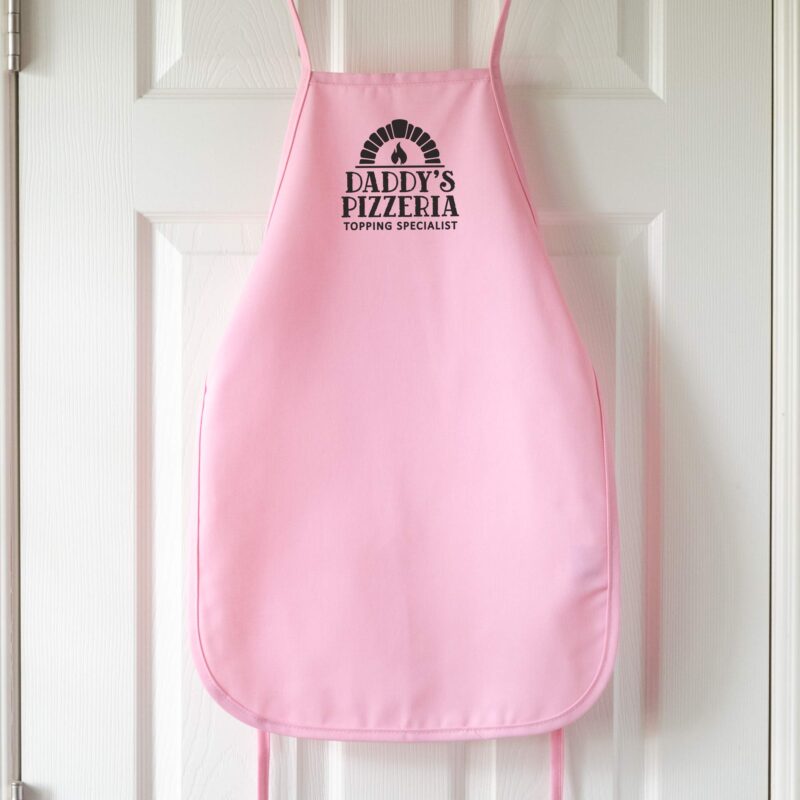 a kids Premium Personalized Pizza Oven Apron in pink