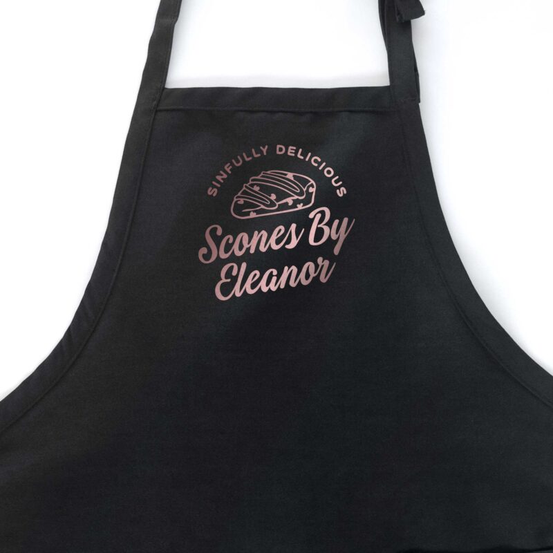 a personalize scone baking apron in black