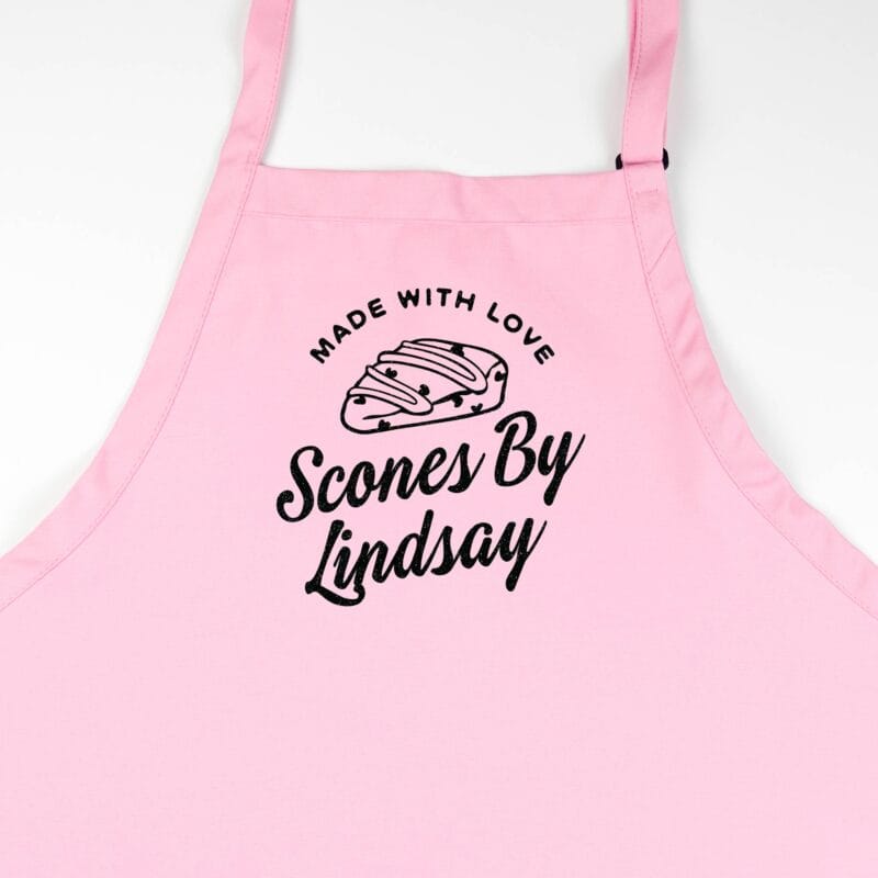 a Premium Personalized Scone Baking Apron in pink