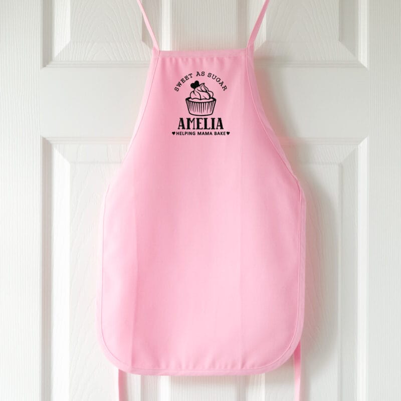 a personalized toddler cupcake baking apron in pink