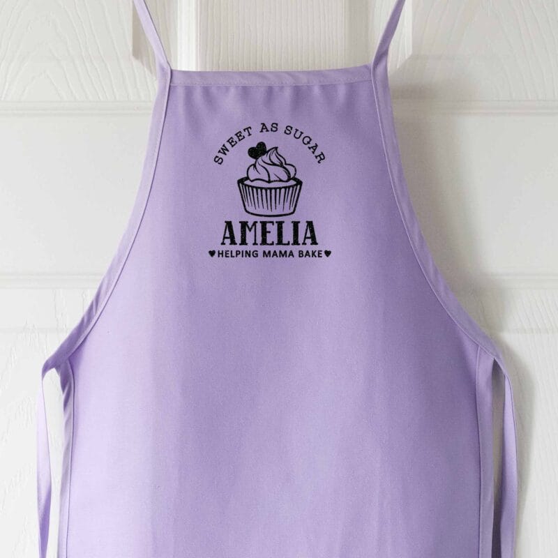 a personalized toddler cupcake baking apron in lavender
