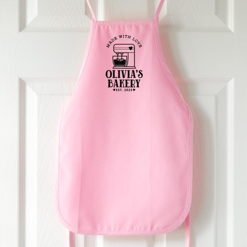 a personalized toddler mixer apron in pink