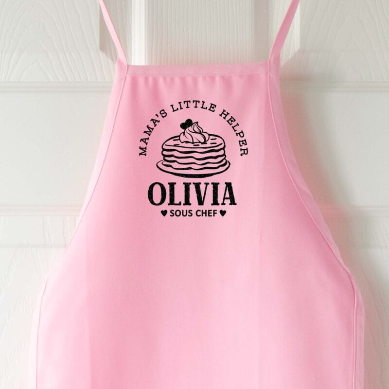 a personalized toddler pancake cooking apron in pink