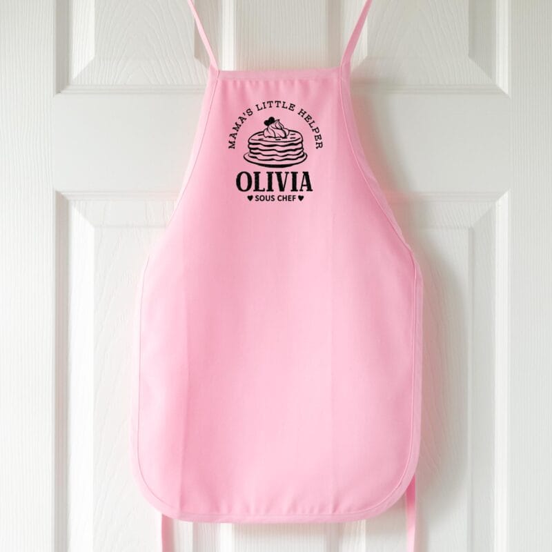 a personalized toddler pancake cooking apron in pink