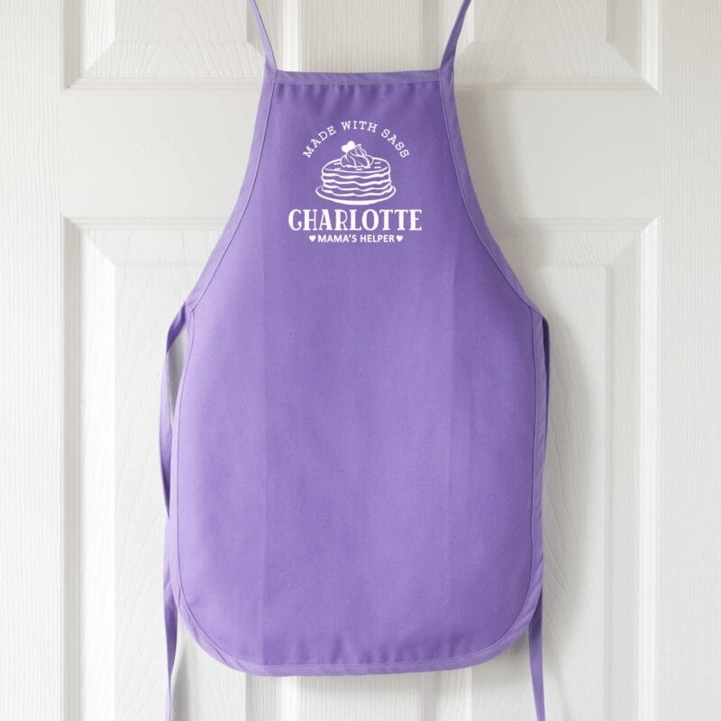 a personalized toddler pancake cooking apron in purple
