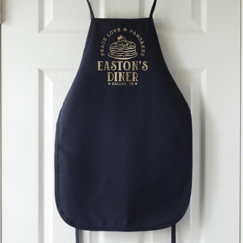 a kids personalized pancake apron in navy