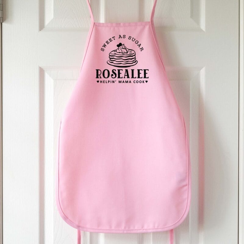 a kids personalized pancake apron in pink