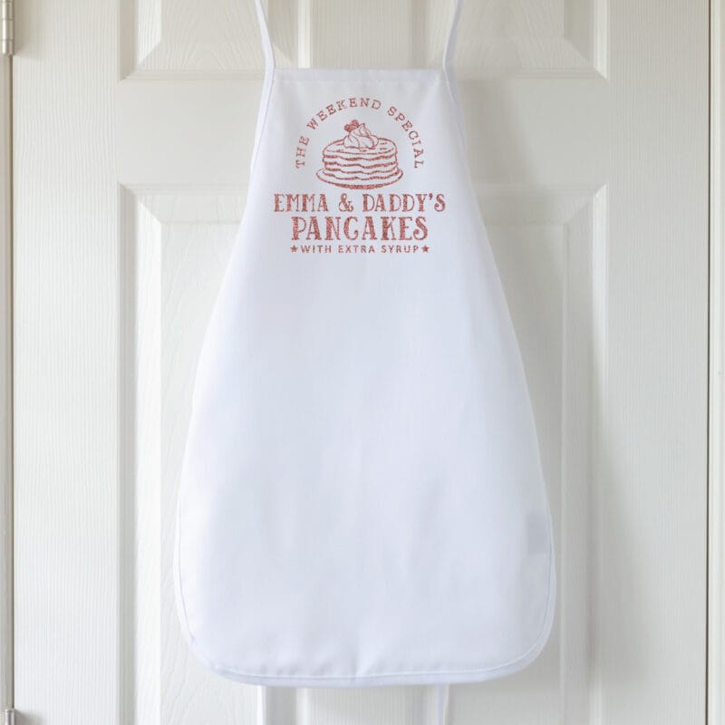 a kids personalized pancake apron in white