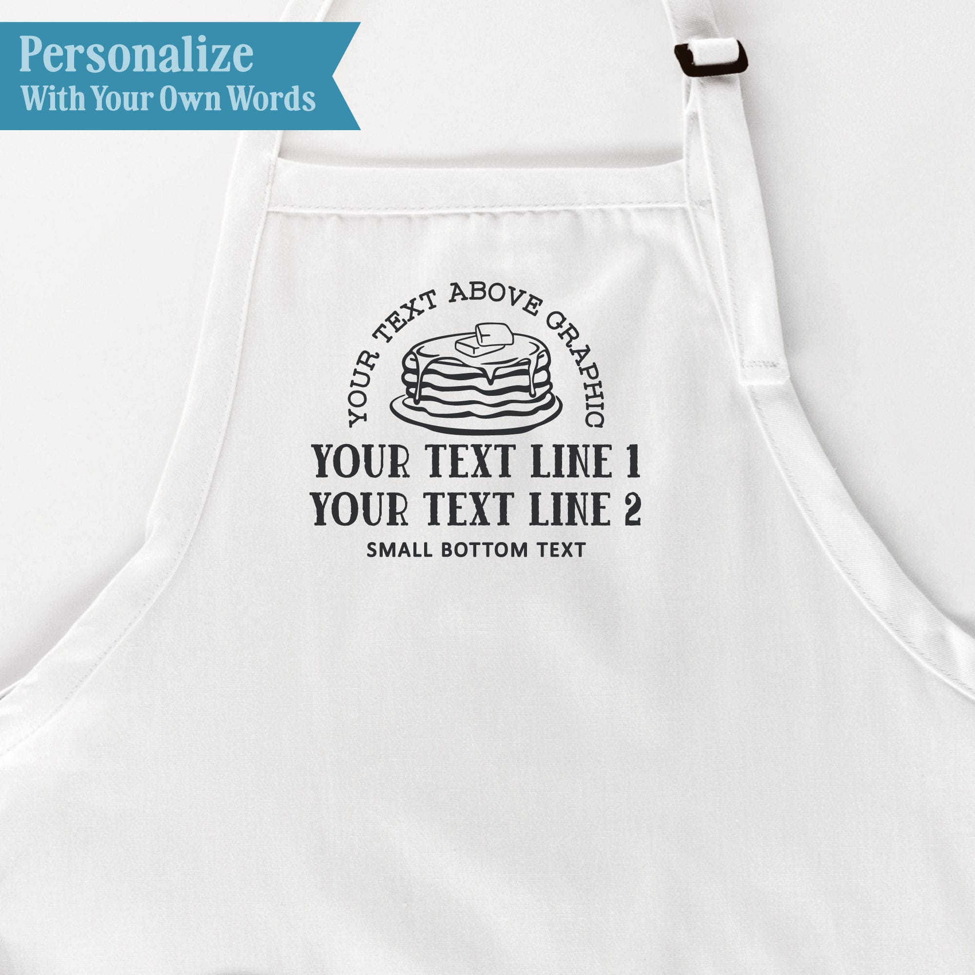 Pancake breakfast apron personalization guide showing text above the butter-and-syrup pancake graphic, two text lines below, and small bottom text.
