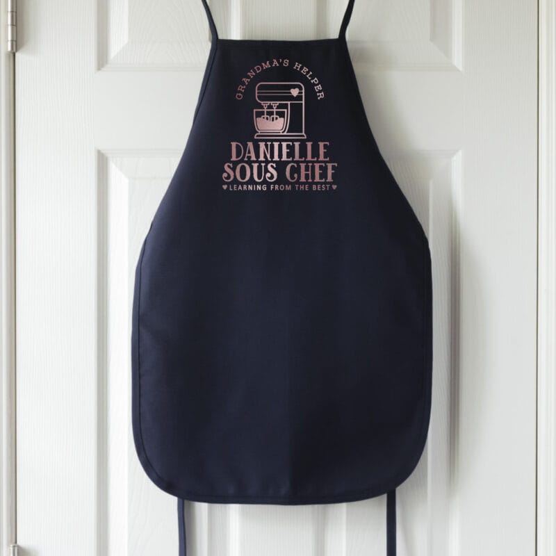 a kids personalized mixer apron in navy