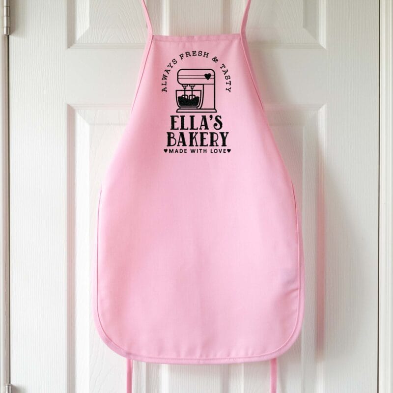 a kids personalized mixer apron in pink